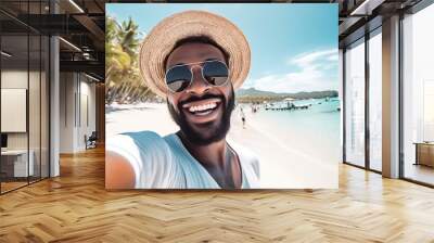 happy man with hat and sunglasses taking selfie picture with smartphone at the beach Wall mural