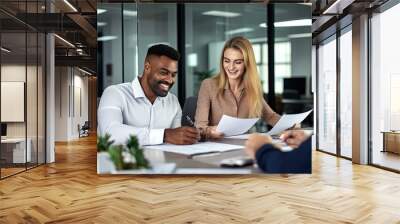 Professional executives business group working with documents at meeting in office. Smiling corporate board team having discussion planning company project strategy sitting at board room table. Wall mural