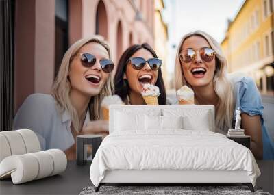 Three cheerful teenage women eating ice cream cones on city street , Happy female tourists enjoying summer vacation, Laughing girl friends taking selfie picture outside , Summertime holidays Wall mural