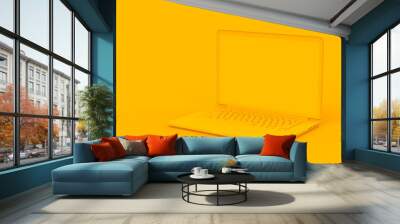 Laptop yellow color on yellow backgrounds. Minimal object computer mockup business online concept. 3D rendering. Wall mural