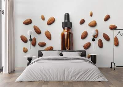 Flat Lay View of Almond Essential Oil in Amber Dropper Isolated on White Background Wall mural