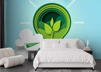 Paper cut of green ecology and environment conservation concept with seedling in light bulb and cloud bubble speech.Vector illustration. Wall mural