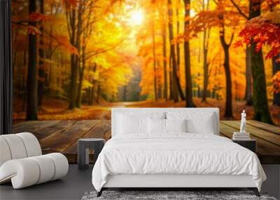 Autumnal wooden table nestles amidst vibrant orange and yellow leaves of fall trees, offering ample copy space for product display on a serene forest backdrop. Wall mural