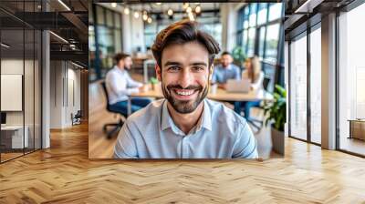 Headshot portrait of smiling millennial male employee talk on video call or web conference in coworking office, profile picture of happy Caucasian young man worker posing in shared workplace Wall mural