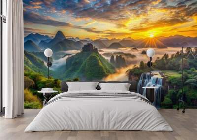 Vibrant sunrise illuminates misty valleys and rugged mountain peaks in a breathtakingly serene high-definition landscape with lush green forests and sparkling waterfalls. Wall mural