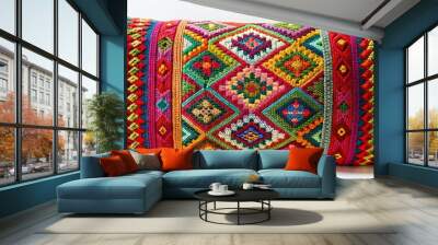 Vibrant textured handmade woven cushion with intricate patterns and bold colors adds a bohemian touch to modern home decor and living spaces. Wall mural