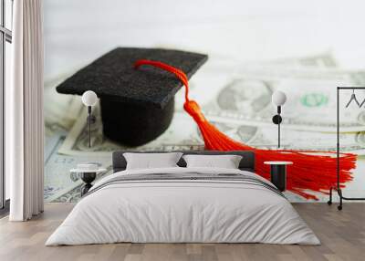 Graduation gap hat on US dollar banknotes money, Education study fee learning teach concept. Wall mural