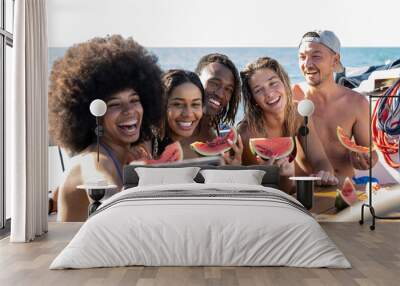 Happy multiracial friends making selfie while eating watermelon at boat party, young people having fun in sea tour, travel and luxury vacation concept, selective focus Wall mural