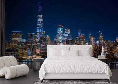 Aerial view of Lower Manhattan skyline by in night in New York City Wall mural