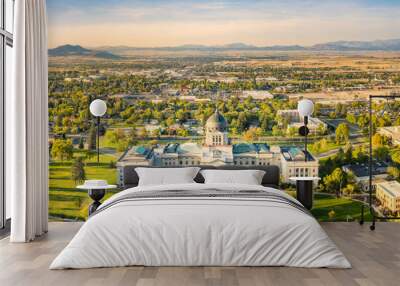 Drone view of the Montana State Capitol, in Helena, on a sunny afternoon with hazy sky caused by wildfires. The Montana State Capitol houses the Montana State Legislature. Wall mural