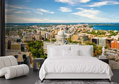 Wisconsin State Capitol and Madison skyline panorama. The Wisconsin State Capitol, houses both chambers of the Wisconsin legislature, Supreme Court and the Office of the Governor. Wall mural