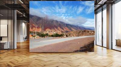 Long shot of the Cerro de los siete colores or the hill of seven colors in Humahuaca in Argentina, South America Wall mural