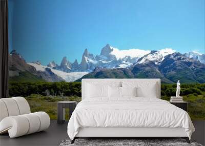 panoramic view of mountain range in el chaltén in argentina with a forest in the foreground and snow Wall mural