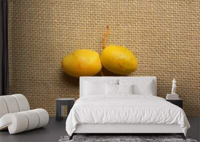 Yellow color ripe whole fresh Dates Wall mural