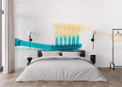 Used toothbrush on an isolated white background Wall mural