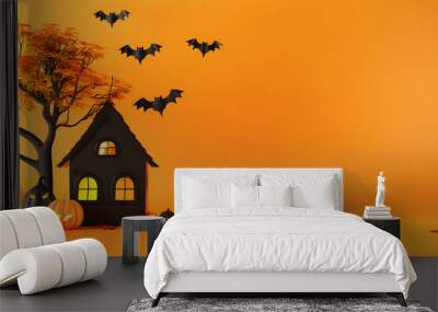 cute halloween house, pumpkin, bats, and tree on orange background with copy space, minimalistic sty Wall mural