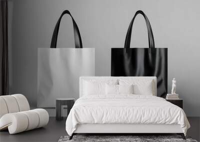 Two stylish tote bags, one white and one black, displayed against a gray background, highlighting minimalist design and versatility. Wall mural