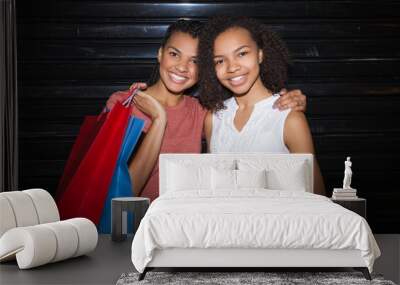 Closeup of Smiling Black Girls With Shopping Bags Wall mural