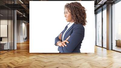 Happy successful female professional looking at copy space away. Young African American business woman with arms crossed standing isolated over white background. Advertising concept Wall mural