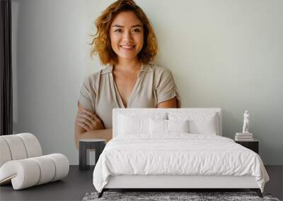 positive asian woman looking at camera and smiling Wall mural