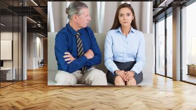 Senior Businessman and Female Colleague on Sofa Wall mural