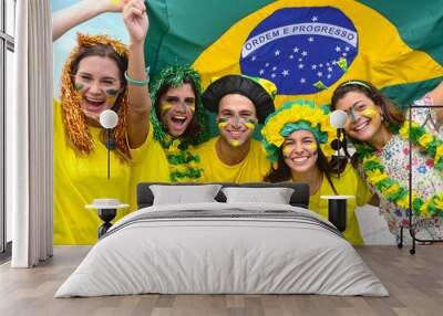 Group of happy brazilian soccer fans commemorating victory. Wall mural