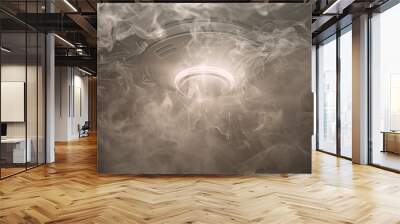 Fire detector engulfs in a haze of smoke signaling potential danger Wall mural