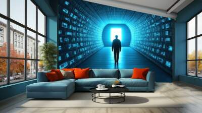 A figure stands at the end of a futuristic tunnel filled with glowing digital screens, symbolizing exploration and technology. Wall mural