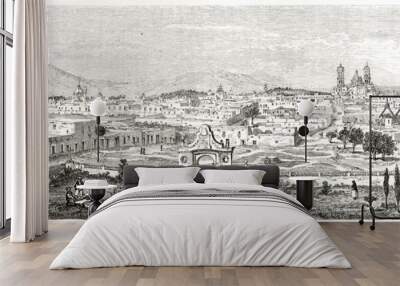 Ancient high panoramic view of western side of Puebla Mexico. City gate at the center of composition, hills in the distance. By Catenacci after photo of Charnay, Le Tour du Monde Paris 1862 Wall mural