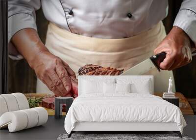 Expert chef effortlessly cuts fresh red meat in a busy kitchen. Wall mural