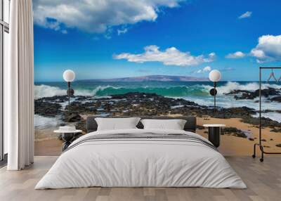 View of beach,ocean,surf and Kahoolawe in the distance from secret beach on Maui. Wall mural