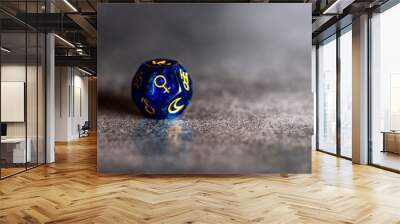 Blue Astrology Dice with symbol of the planet Venus on grey background Wall mural