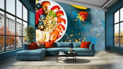 Yogurt breakfast bowl topped with fresh fruits and granola, ideal for a balanced morning meal Wall mural