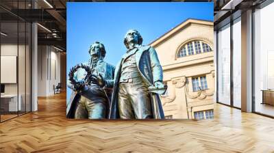 Famous sculpture of Goethe and Schiller in the city of Weimar in Germany / Most famous classical german authors / 18th century Wall mural