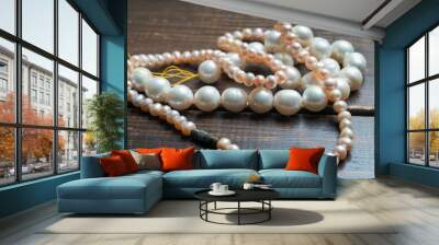 Real or artificial pearls (don't know) - jewelry for women. Brought from India Wall mural