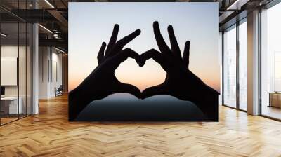 silhouette of heart shape with hands Wall mural