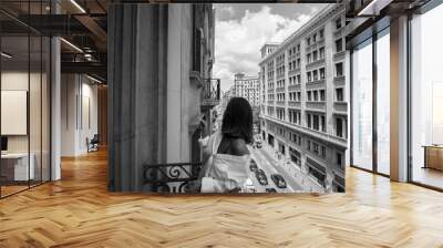 woman posing in a balcony Wall mural