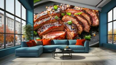 A beautifully plated grilled steak sliced on a black plate, garnished with green onions, capturing the essence of a gourmet meal that is both appetizing and visually appealing. Wall mural