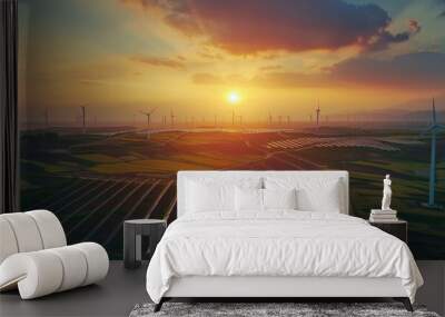 Modern Wind turbines and solar panels sunset light. Concept eco green renewable energy. Wall mural