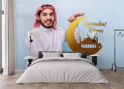 Saudi man wishes for Ramadan Kareem. Wall mural