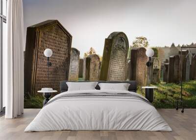 european jewish cemetery with illegible engravings on headstones Wall mural