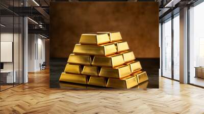 Stacked gold bars on dark background Wall mural