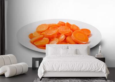 Cooked carrots plate isolated on white background Wall mural