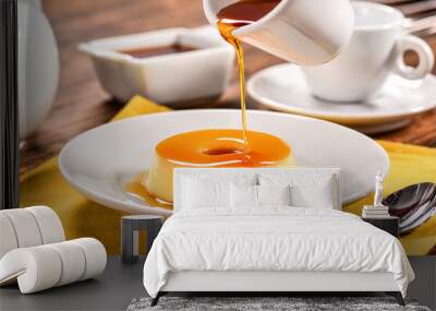 Vanilla pudim with caramel sauce on decorated scene Wall mural