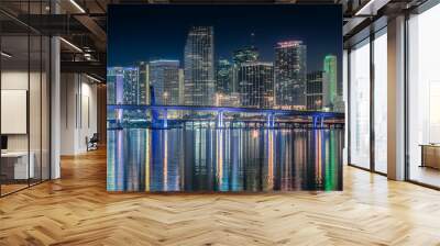 Miami skyline by night with illuminated skyscrapers Wall mural