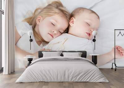 charming little brother and sister asleep Wall mural