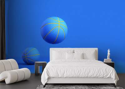 Basketball minimal blue background. Basketball balls isolated on Simple blue background. Sport game blue minimalist mock up concept. Toned blue and gold solid dark color isolated basketball image. Wall mural