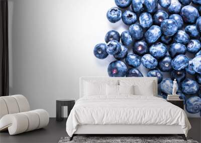 Fresh blueberry fruit on white border background Wall mural