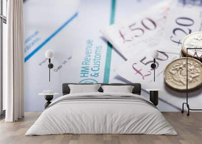 Paying taxes in Uk, notes and sterling coins Wall mural