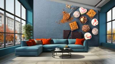 selection of artisan chocolates praline on black background Wall mural